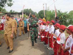 Pelajar SD Ikut Meriahkan Pembukaan TMMD Sengkuyung Tahap I TA 2026 Diwilayah Kodim Pati