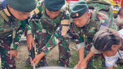 Hangatkan Kebersamaan, Prajurit Yonif 136/Tuah Sakti Gelar Makan Bersama Warga Distrik Kalome