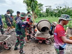 Cuaca Tak Mampu Meluluhkan Semangat Satgas TMMD Untuk Terus Bekerja