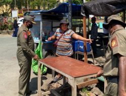 Satpol PP Kota Jayapura Tertibkan PKL Di Jalan Protokol